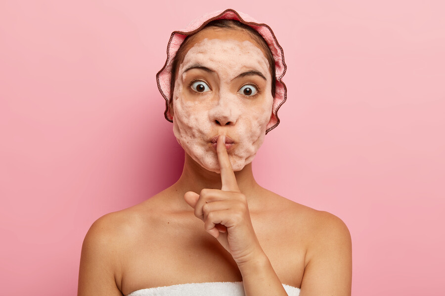 image-surprised-korean-lady-with-soap-bubbles-face-makes-silence-gesture-tells-beauty-secret-cleans-exfoliates-skin-has-cosmetic-procedures-free-time-takes-care-herself_1a345.jpg
