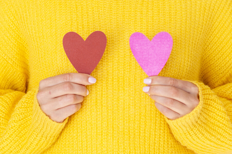 female-holding-paper-hearts-front-view_2bfbc.jpg