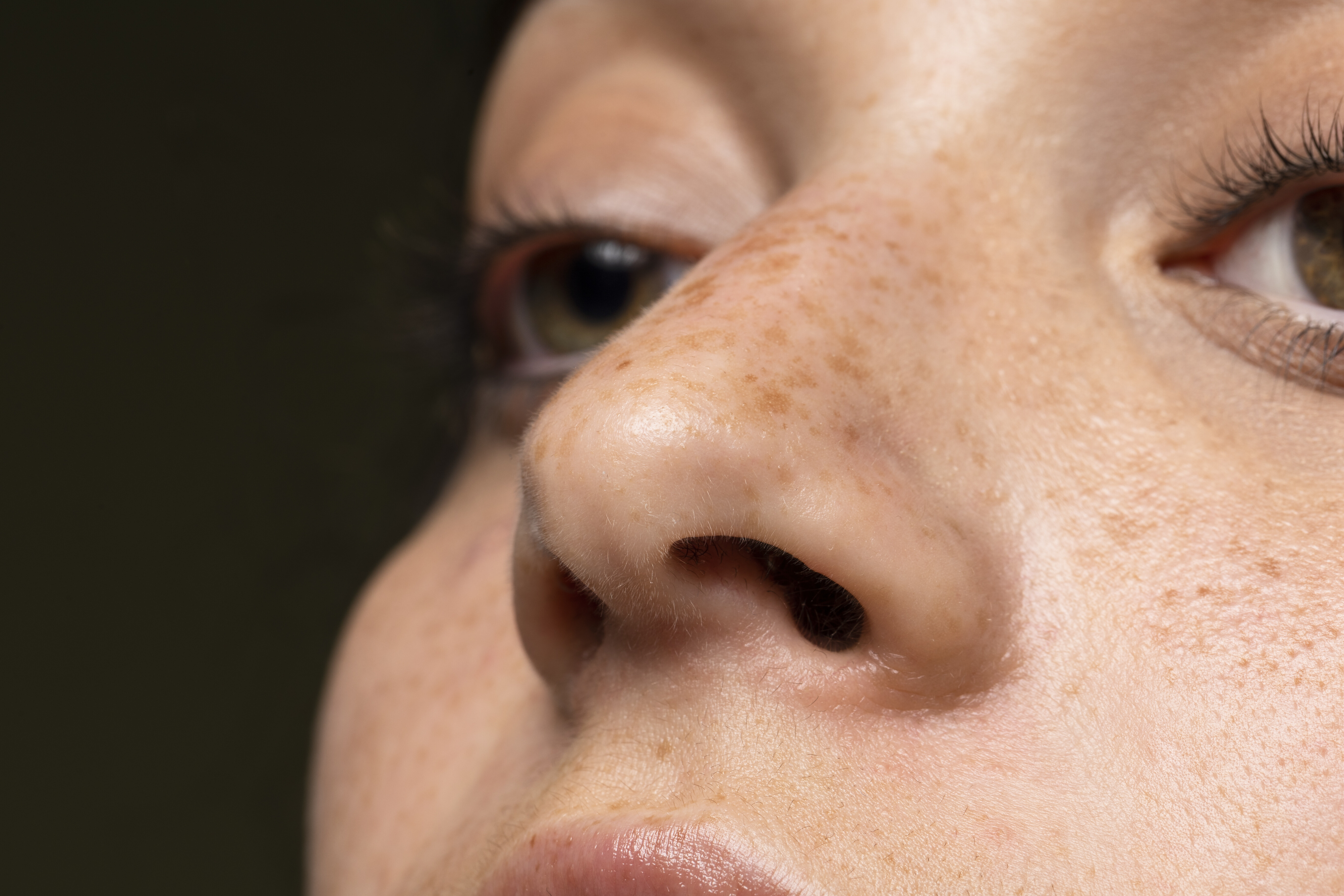 close up woman with freckles daf39