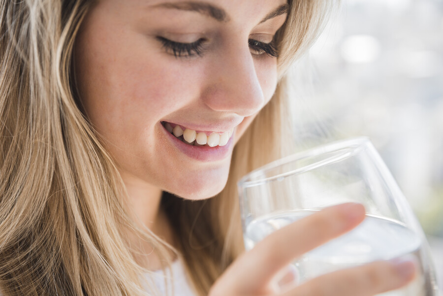 healthy-girl-holding-glass-water_bd40c.jpg