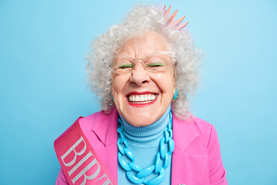 portrait-cheerful-senior-woman-chuckles-closes-eyes-smiles-broadly-has-white-perfect-teeth-enjoys-spending-free-time-party-celebrates-special-occasion-women-retirement-age-concept_5bdf9.jpg
