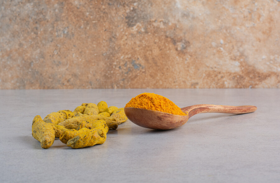 blended-curcumin-powder-wooden-spoon_389ce.jpg