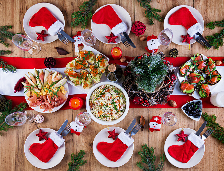 christmas-table-is-served-with-appetizer-decorated-with-bright-tinsel-candles-table-setting-christmas-dinner-flat-lay-top-view_4ffab.jpg