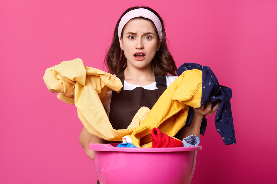 portrait-astonished-woman-with-huge-pink-basin-with-fresh-clothes-home-textile_620a8.jpg