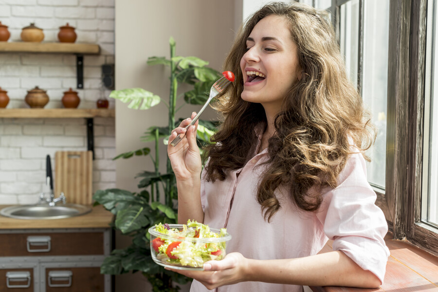 brunette-woman-eating-salad_fc48f.jpg