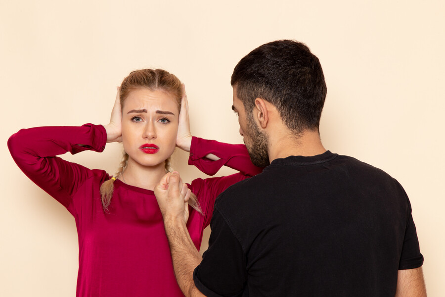 front-view-young-female-red-shirt-suffers-from-physical-threats-violence-with-shut-ears-cream-space-female-cloth-photo_35830.jpg