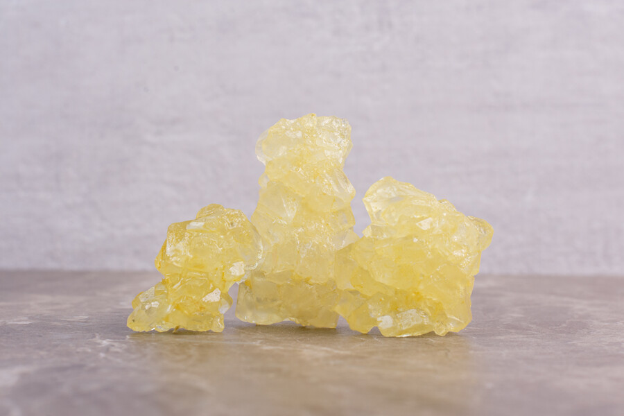 yellow-sugar-candies-marble-table_4ce0e.jpg