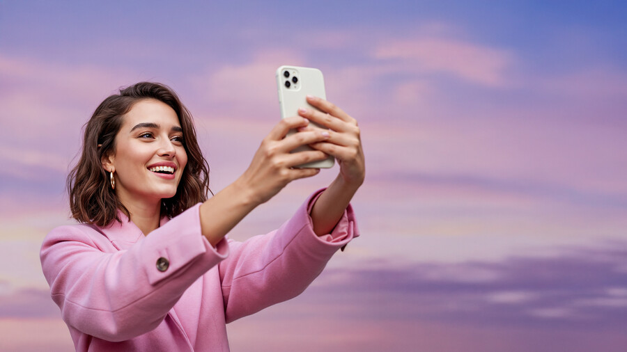 woman-taking-selfie-with-phone-beautiful-sky-background_23e31.jpg