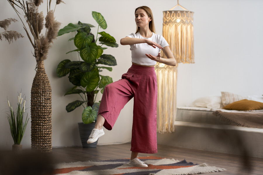 person-practicing-tai-chi-indoors_e83ec.jpg