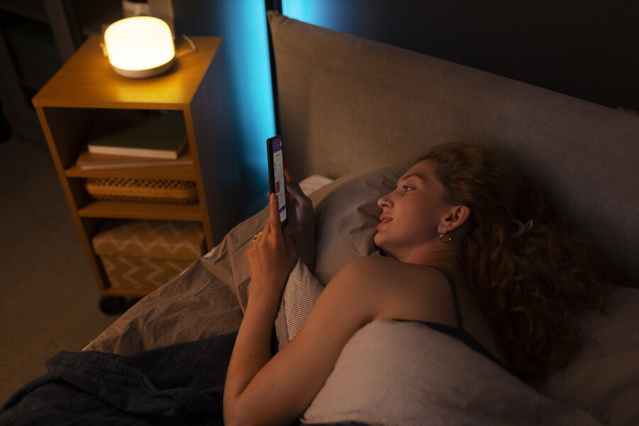 high-angle-woman-laying-bed_fcadc.jpg