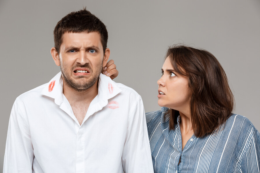 young-woman-quarreling-angering-with-drunk-husband-grey-wall_e69d2.jpg