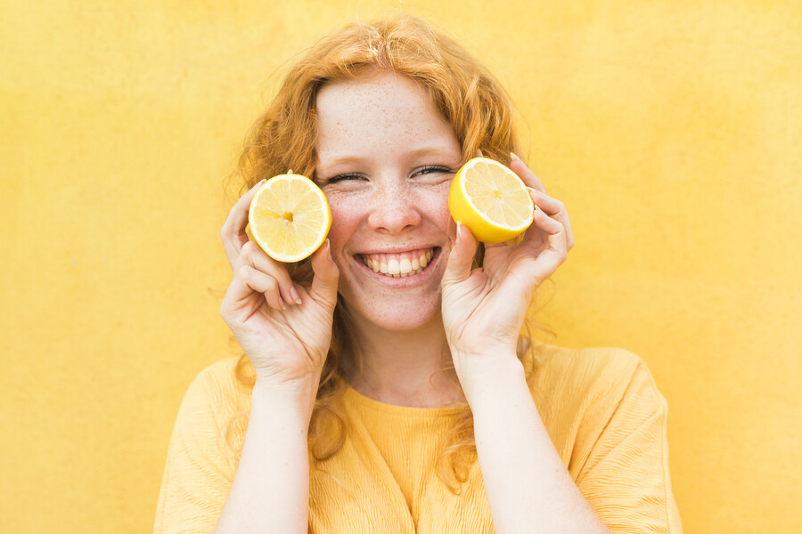 smiley-woman-holding-lemons_0b883.jpg