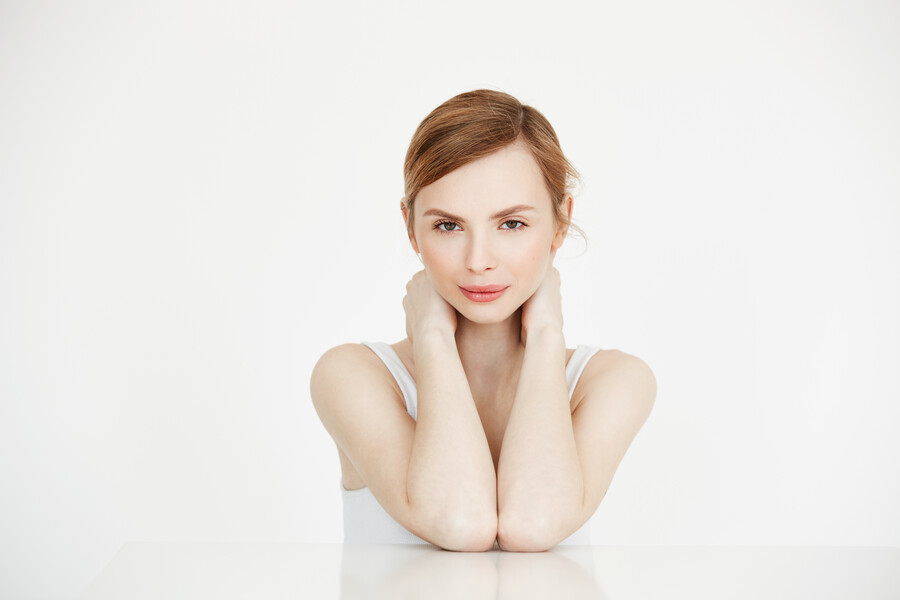young-beautiful-girl-with-perfect-clean-skin-smiling-sitting-table-beauty-spa-cosmetology_87e6d.jpg