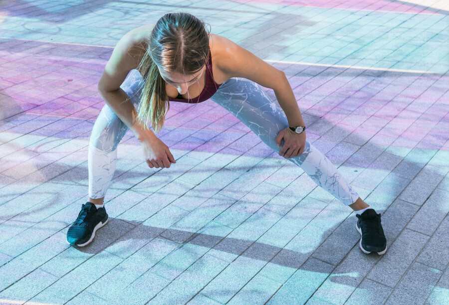 young-woman-gym-doing-stretching-exercises_2c055.jpg