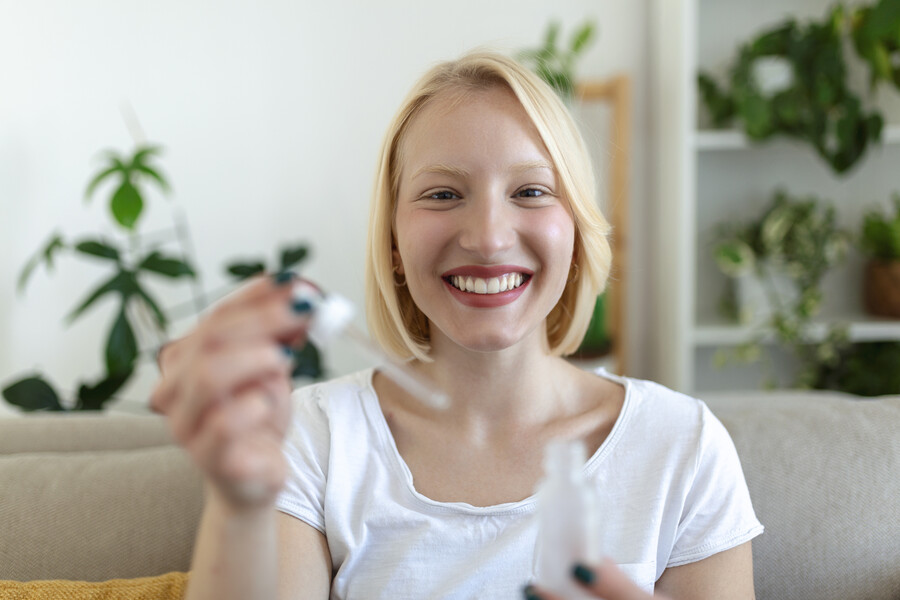 young-pretty-woman-getting-special-skin-treatment-home-beautiful-girl-applying-eye-serum-smooth-skin-without-wrinkles_b0aec.jpg