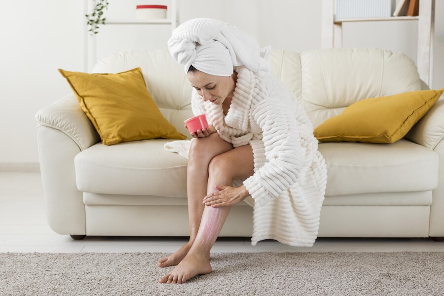 spa-home-woman-moisturize-her-legs-with-cream_5a673.jpg