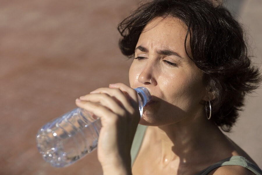 elder-woman-struggling-with-high-temperature_1539d.jpg