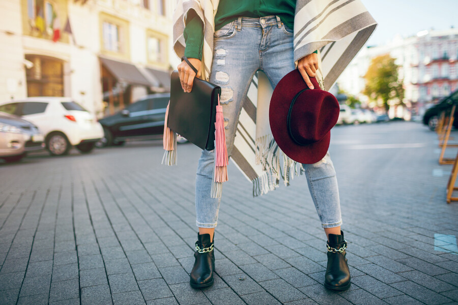 close-up-woman-legs-wearing-black-leather-boots-jeans-footwear-spring-trends-holding-bag_8ec01.jpg