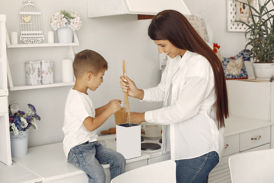 mother-with-little-son-having-fun-home_dbf37.jpg