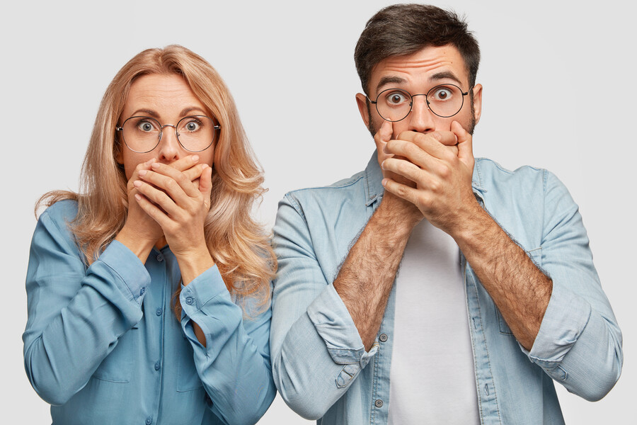 speechless-lovely-blonde-woman-handsome-man-cover-mouthes-being-frightened-see-something-awful_204591614cd91316.jpg