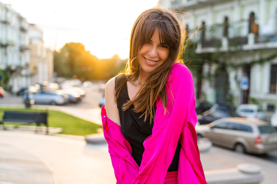 outdoor-summer-portrait-debonair-good-looking-woman-stylish-pink-jacket_94ad60e91c053d7a.jpg