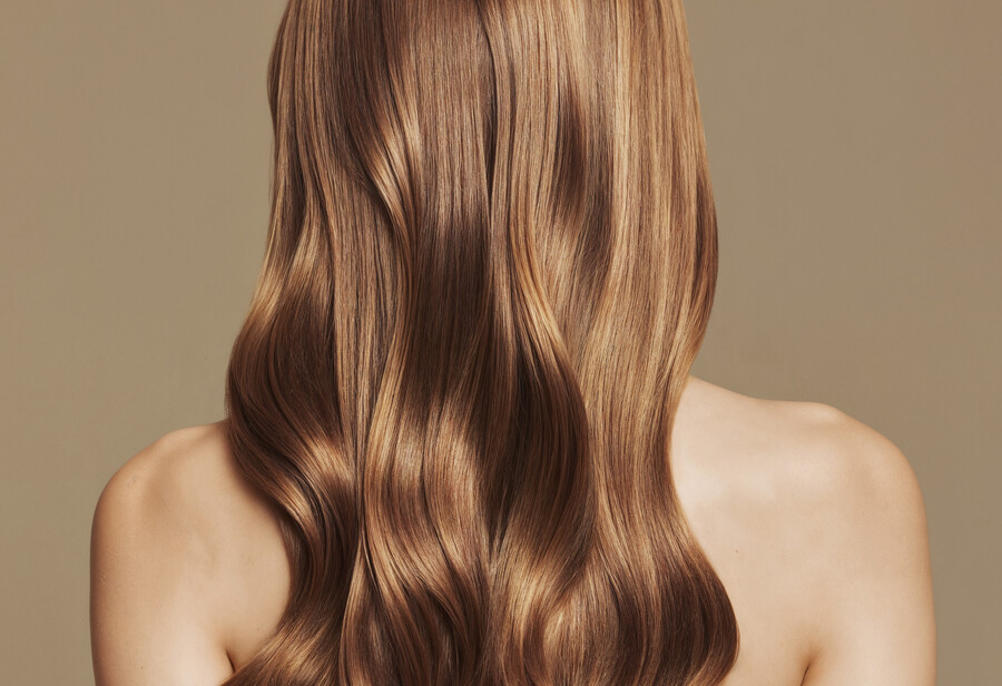 beautiful-woman-with-long-wavy-brown-hair_94157b6a5d679a96.jpg