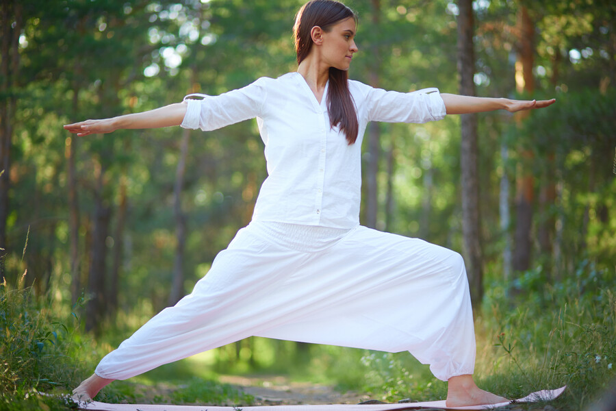 barefoot-woman-stretching-nature_cf0987a9f629bbc0.jpg